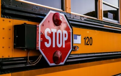 Collision between school bus and SUV leaves driver seriously injured